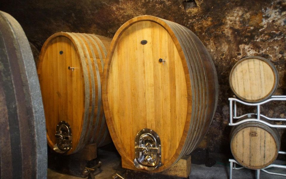 Wine barrels in wine cellar of the Biegler & Brand winery in Alzey