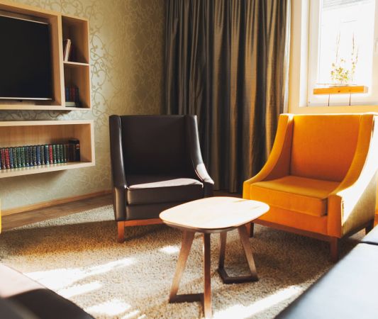 Comfortable armchairs in the Herrenzimmer at the Weinhotel Kaisergarten